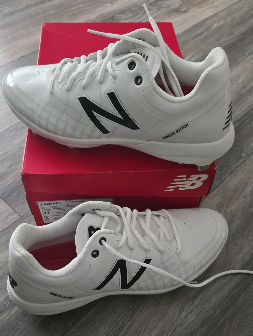 New Balance Men’s White Athletic Cleats with Black N Logo